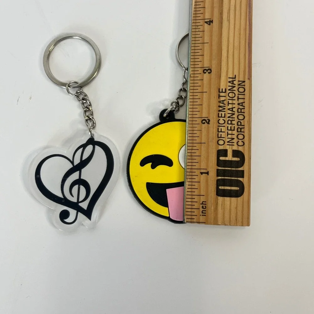 Emoji Winking Face with Tongue and Treble Clef Heart Keychains Set of 2